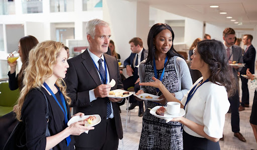 Colleagues networking over a bite to eat.