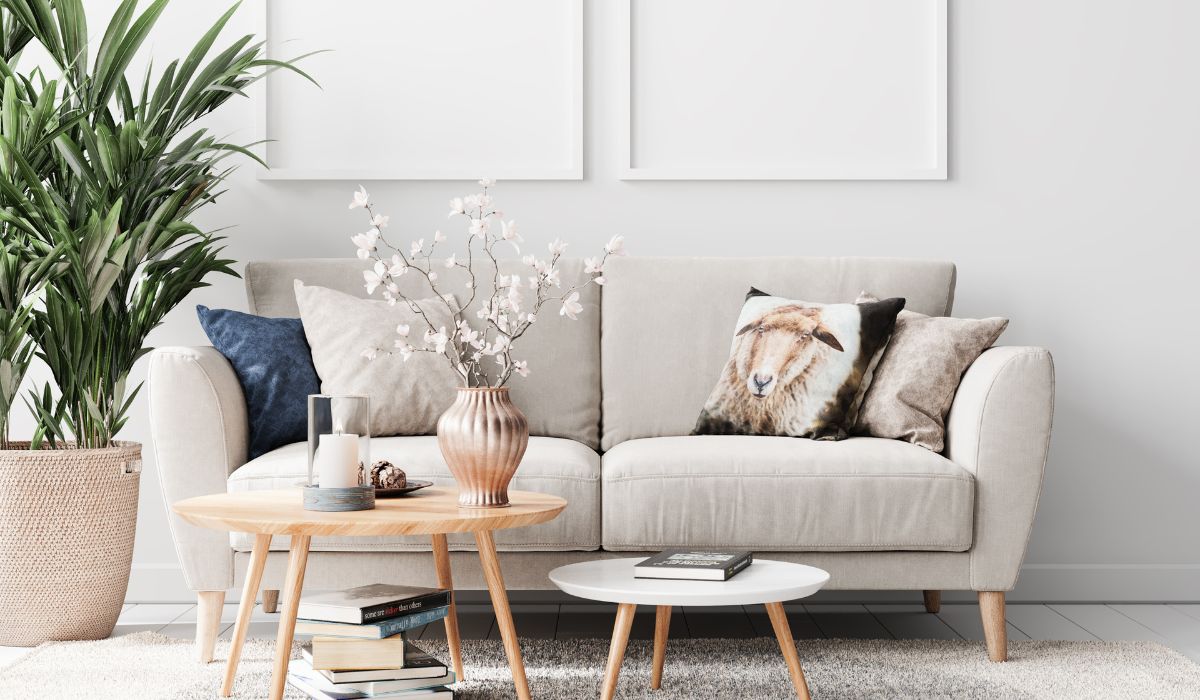 Couch With two tables and a plant