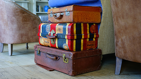 Packing books in suitcases